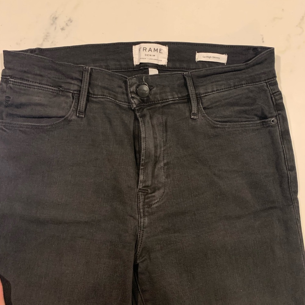Frame distressed cropped black jeans with frayed hem.  Size 29.